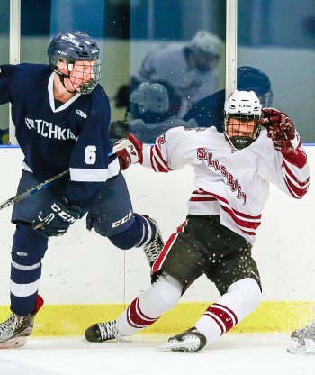 Hotchkiss junior D Marshall Rifai gets physical against Salisbury's Vellu Vanttinen.