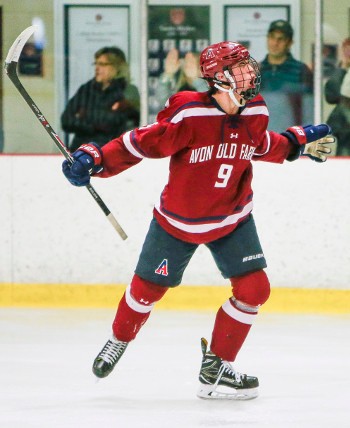 Avon junior Nick Wildgoose celebrates 2nd period goal that put Avon up, 5-1, over Salisbury on Saturday. Avon held on to win, 5-4.