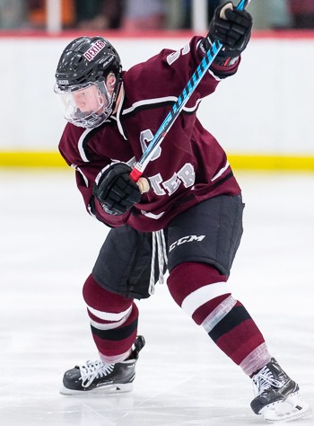 Dexter senior D Jack Rathbone, a Harvard commit, in a familiar shot, teeing one up from the point.