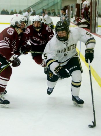 Salisbury's Nick Capone (17) and Brendan Reynolds (27) close in on Westminster's Ned Blanchard (5) in Wednesday quarterfinal action. 