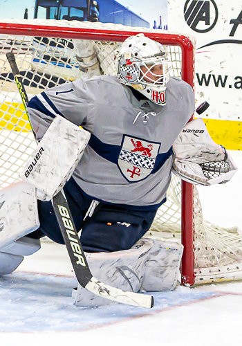 Kent senior goaltender Aidan Hopewell kicked out 36 shots to help lead the Lions to a 3-2 win over Dexter in the Large School Championship Game Sunday